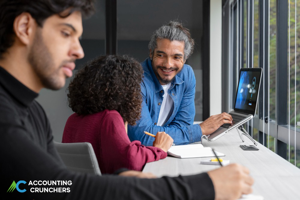 Accountant using digital tools for smart tax planning and financial management for SMEs in the UK in 2025